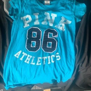 pink athletics teal shirt